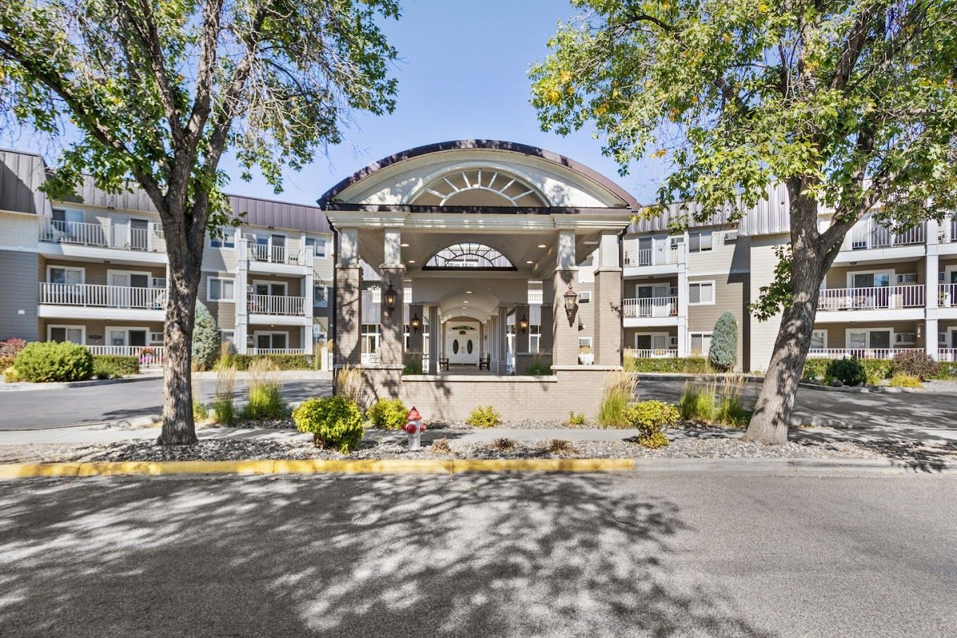 Exterior view of Westpark Village entrance with gardens
