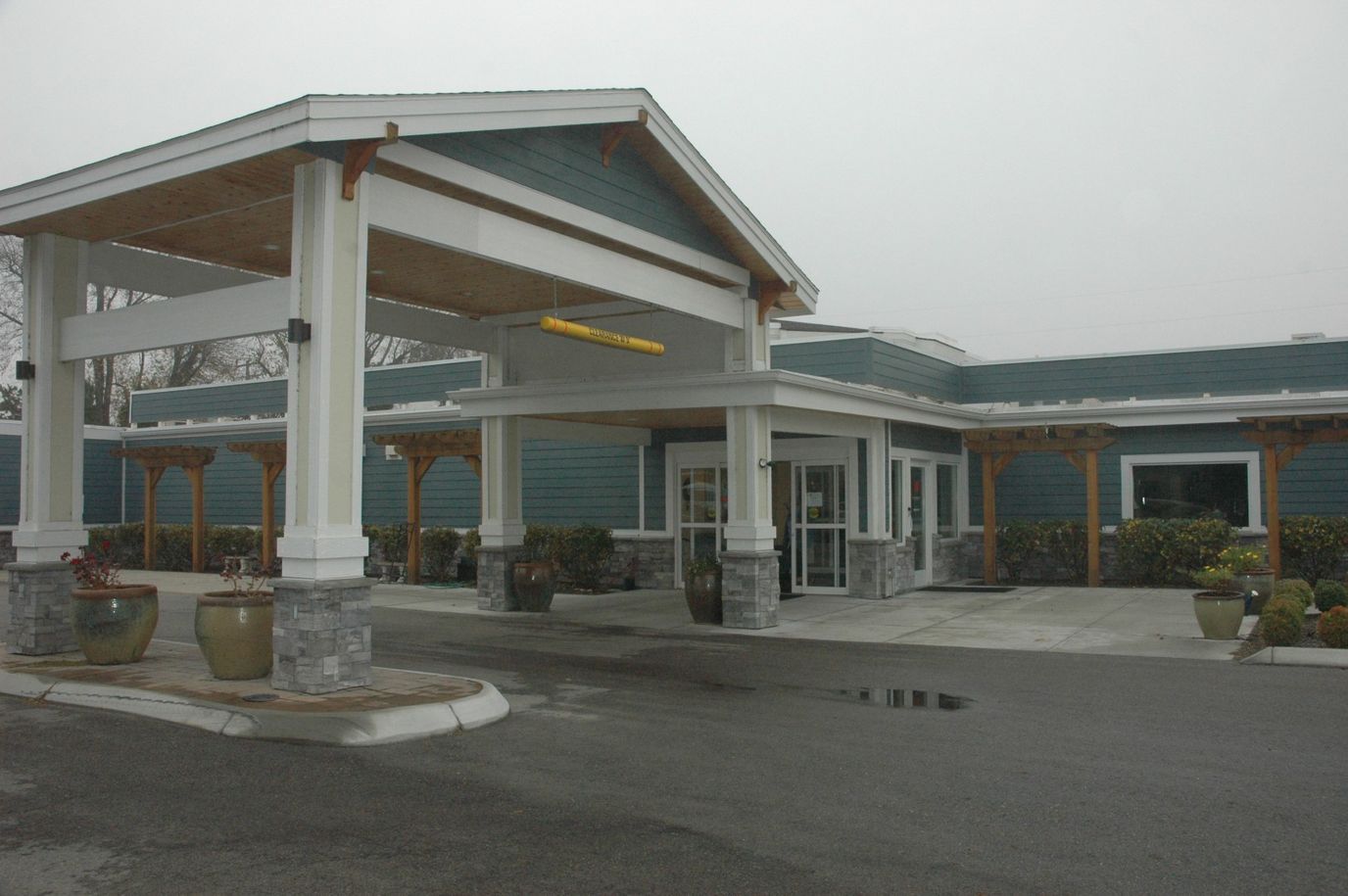 Exterior view of Heatherwood Senior Living building entrance