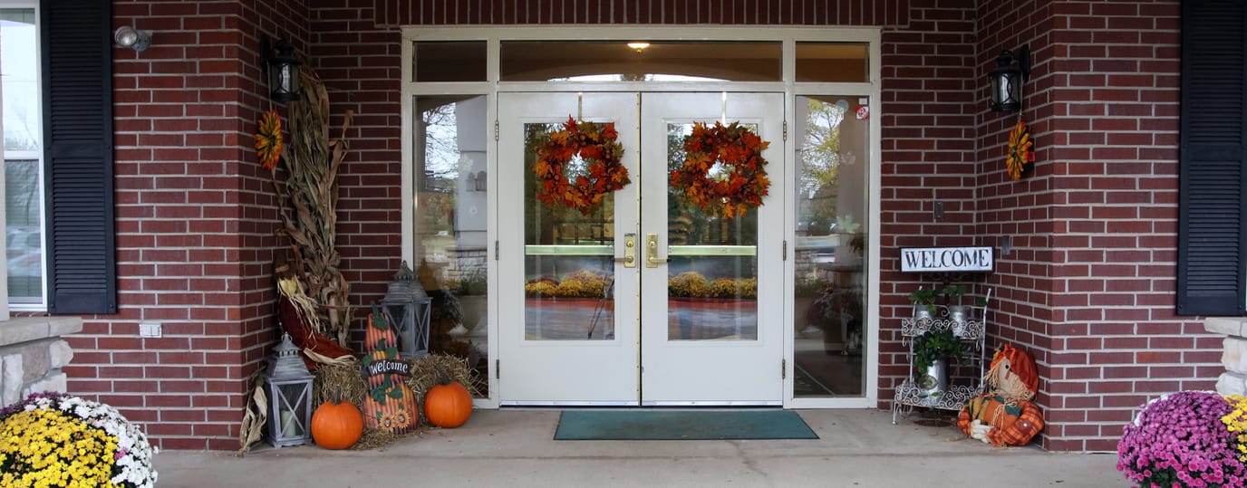 Entrance of Bickford of Rockford decorated for fall