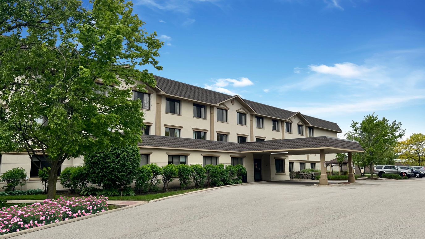 Exterior view of Bella Terra Streamwood with a covered entrance