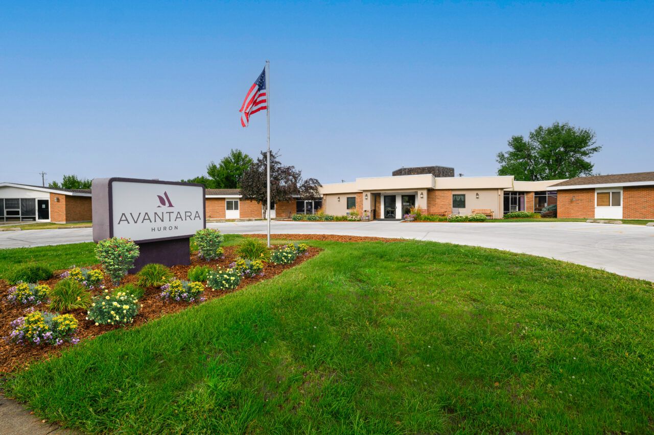 Exterior view of Avantara Huron with landscaped grounds