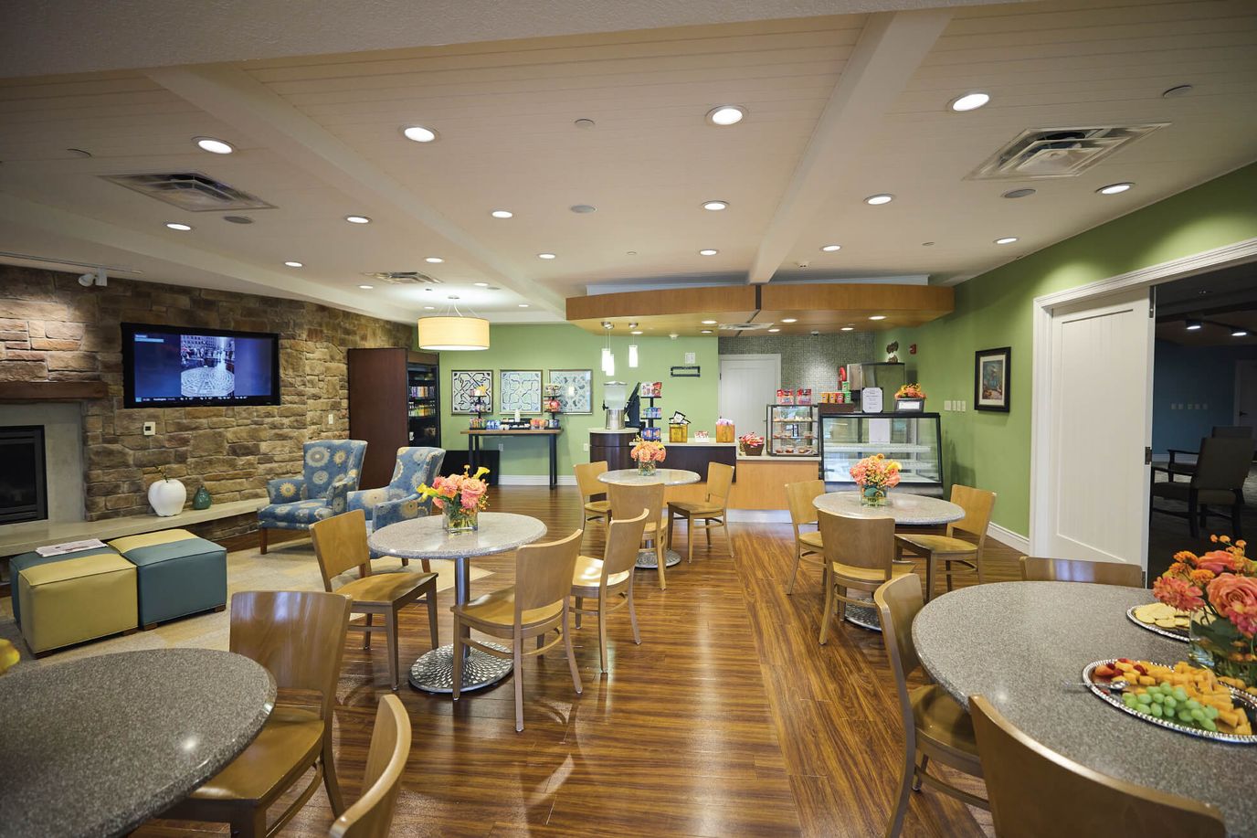 Interior of a common area with tables and decor