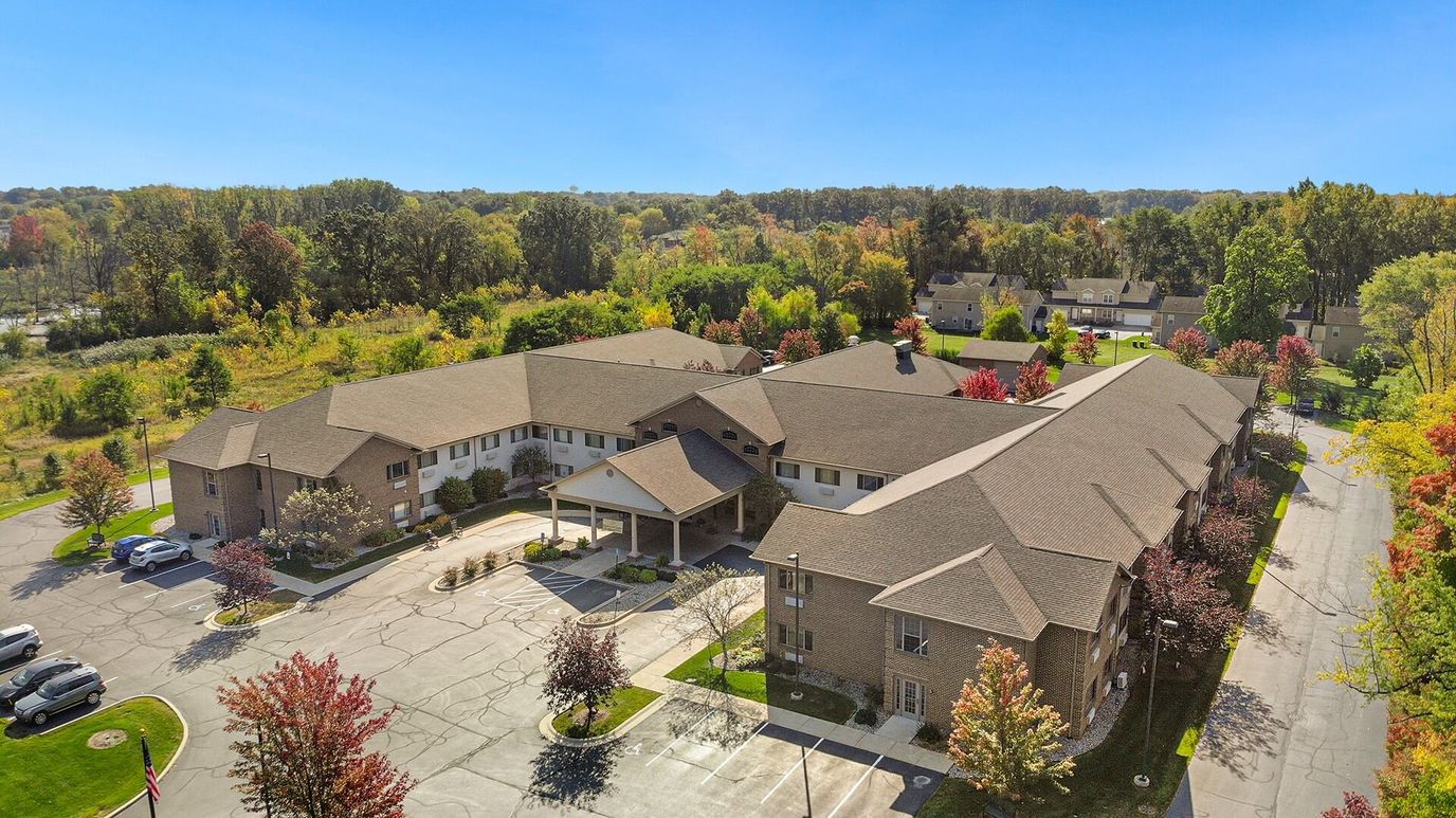 Aerial view of the facility with autumn foliage