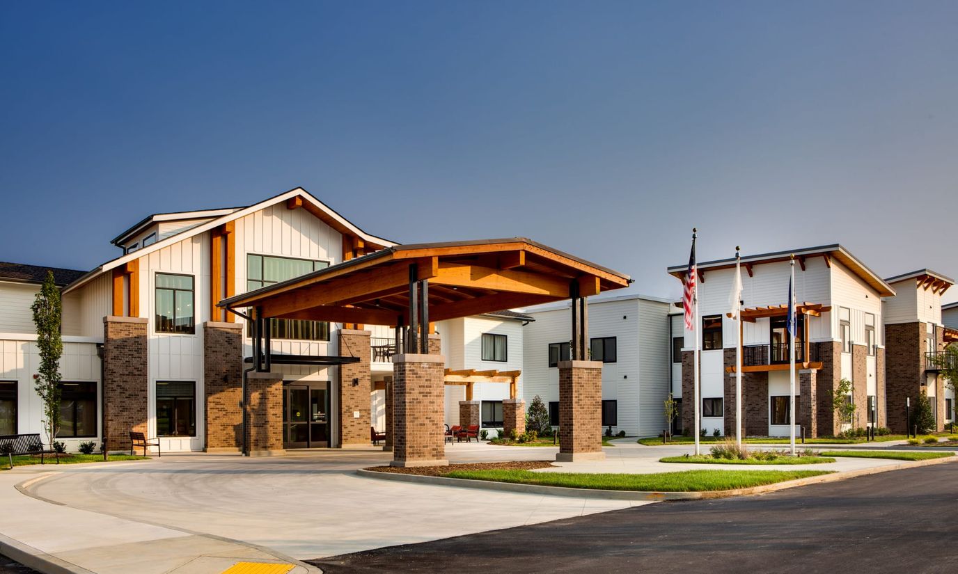 Exterior view of Preston Greens Senior Living facility entrance