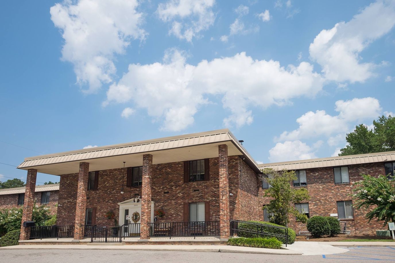 Exterior view of a brick nursing home building