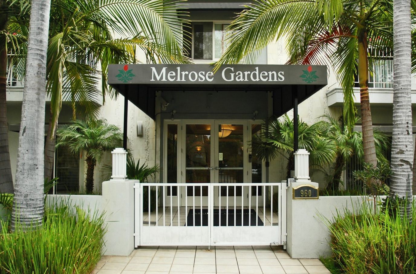 Entrance of Melrose Gardens with tropical plants