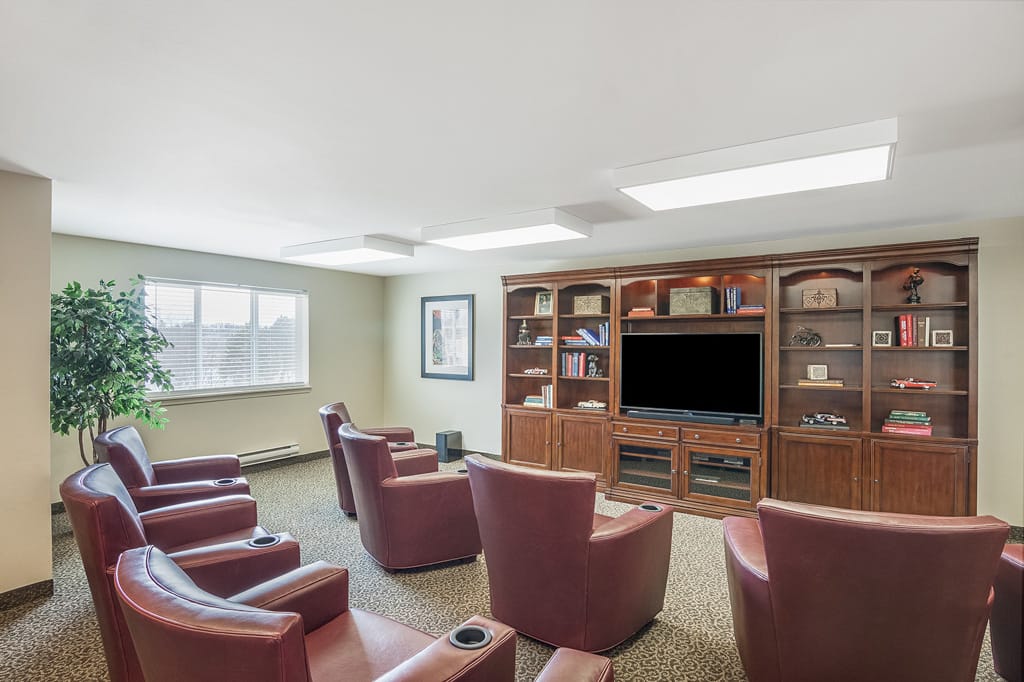 Cozy lounge area with seating and shelves