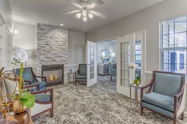 Cozy common area with elegant seating and fireplace