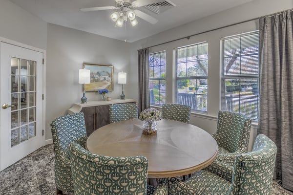 Cozy dining area with round table and chairs
