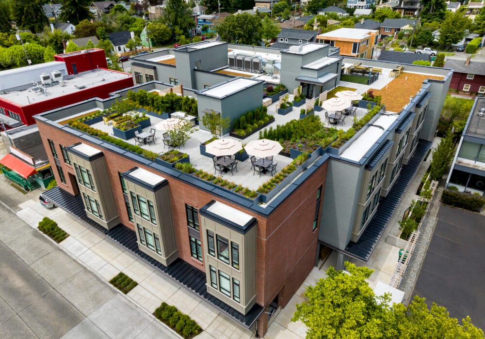 Aerial view of a senior living facility with outdoor spaces