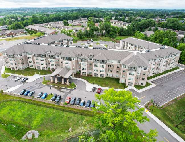 Harmony at Mt Juliet, assisted living in Bowling Green, KY — Aerial view of a senior living facility with parking lot