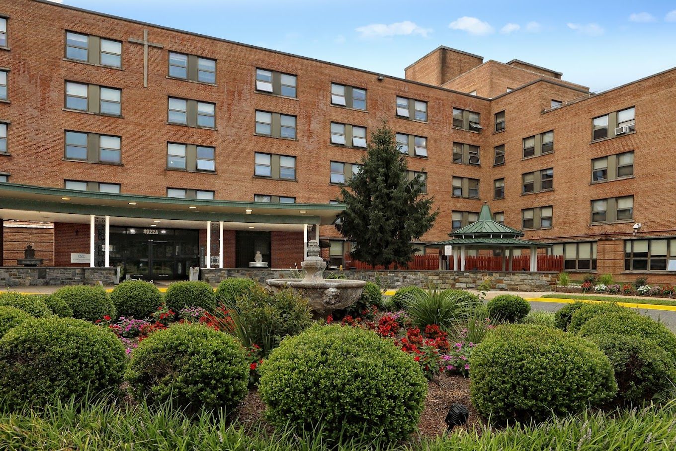 Exterior view of Complete Care in Hyattsville with landscaped garden