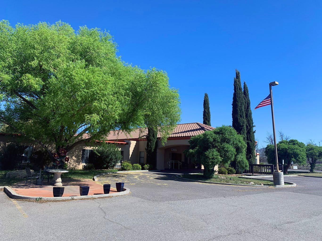 Exterior view of Desert Peaks Assisted Living facility with landscaping