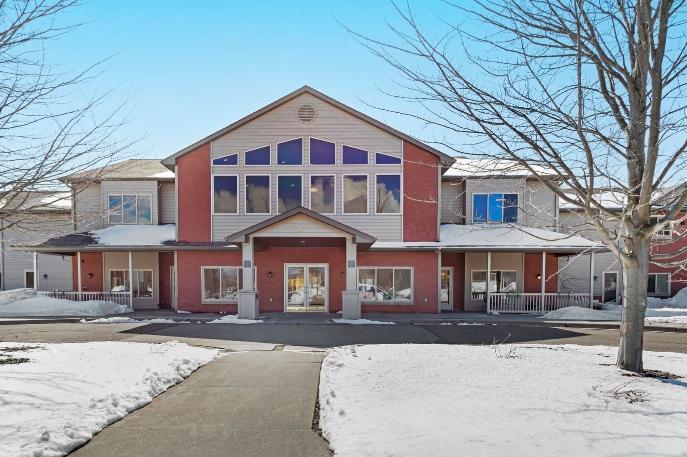 Exterior view of Duluth Heights Lodge Senior Living building in winter