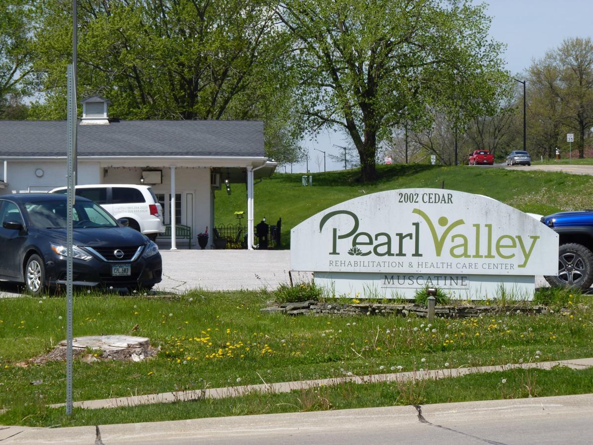 Exterior view of Pearl Valley Rehabilitation and Healthcare Center with signage
