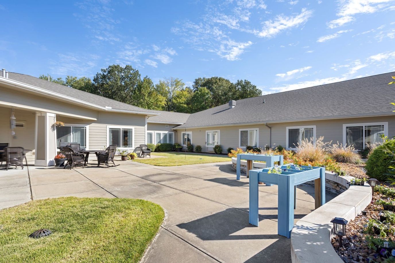 Outdoor courtyard with seating and garden areas