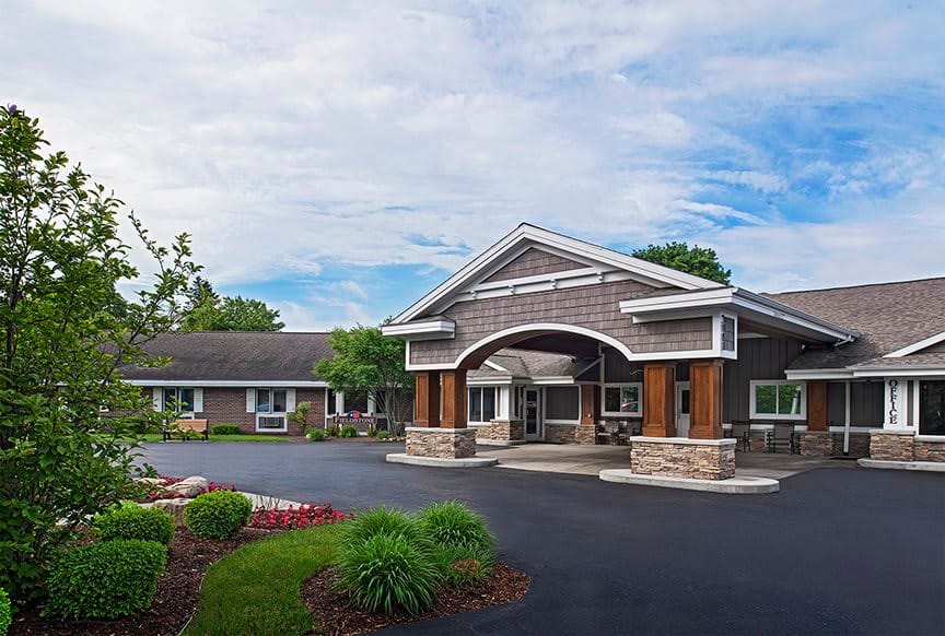Entrance view of Willow Creek West AFC with landscaped exterior