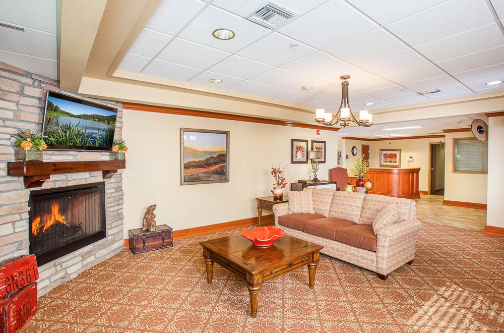 Cozy common area with a fireplace and seating