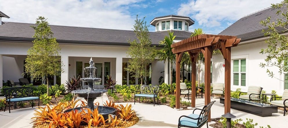 Beautiful outdoor space with seating and fountain