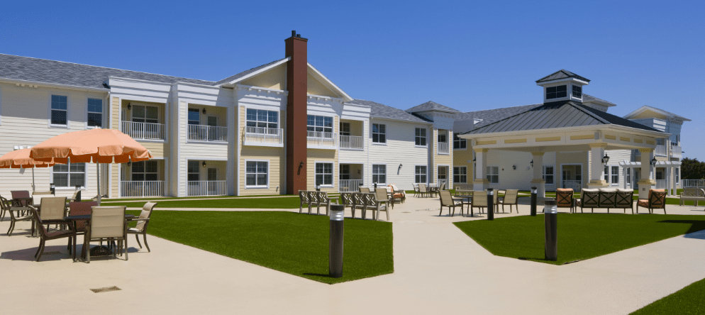 Outdoor seating area with well-maintained landscape