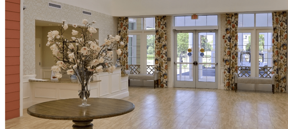 Bright and welcoming lobby area with floral decor