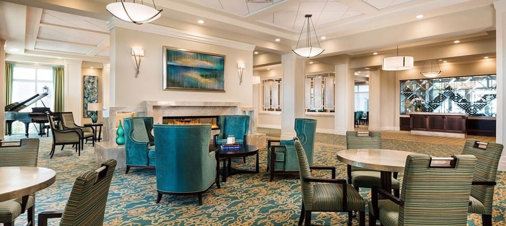 Interior of a bright common area with seating