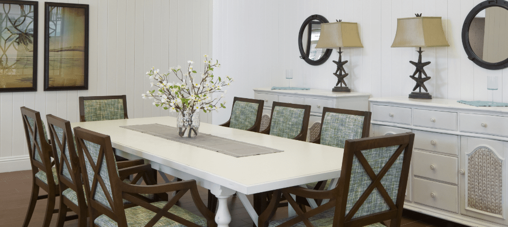 Bright and modern dining area with floral centerpiece