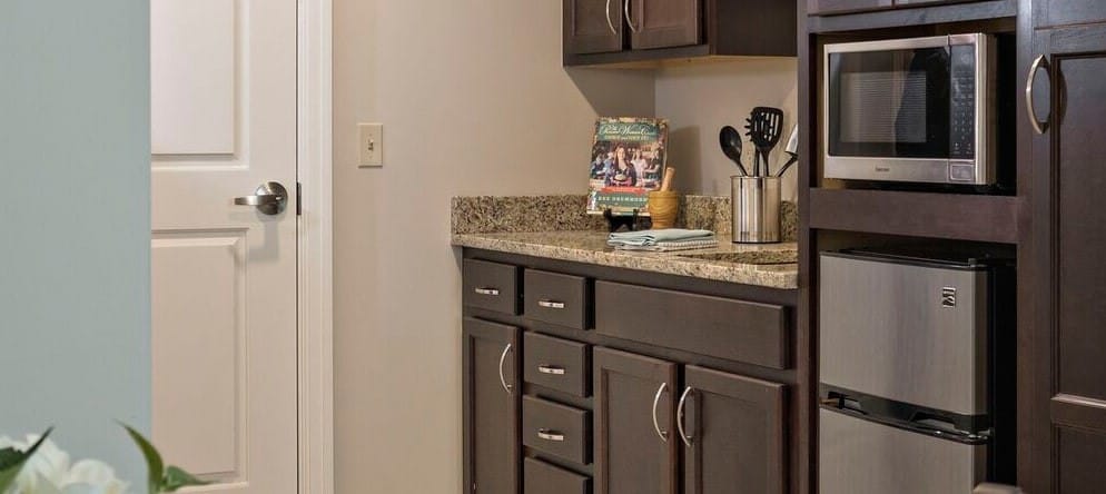 Well-equipped kitchenette in a resident's room