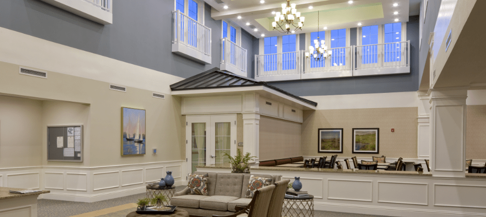 Bright common area with seating and decor