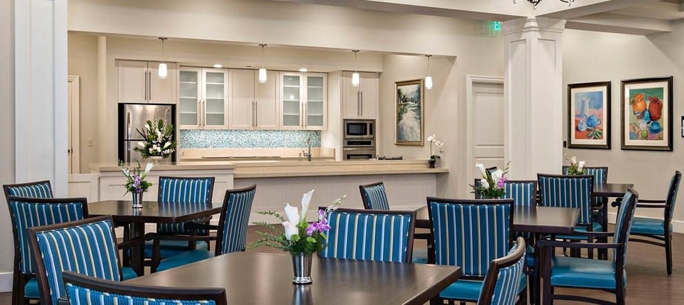 Bright dining room with tables and chairs