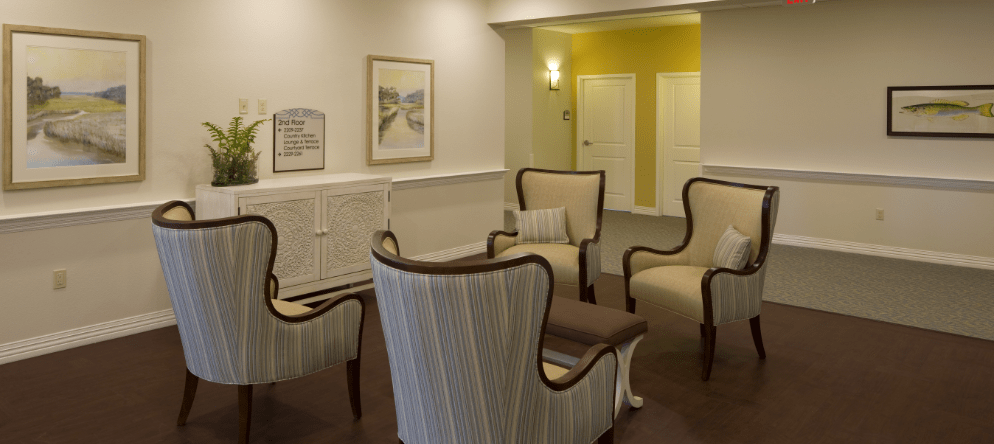Cozy common area with seating and artwork