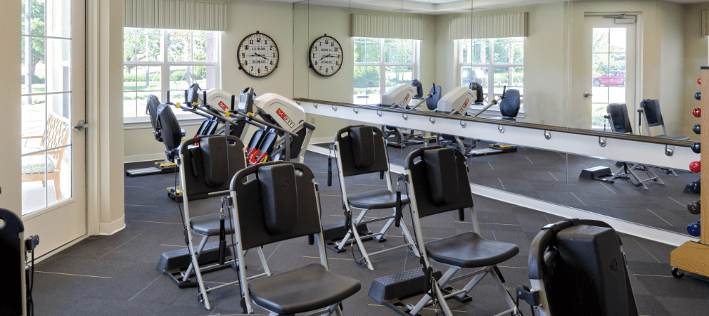 Interior view of a fitness area with exercise equipment