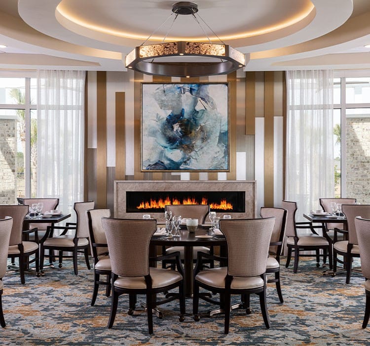Elegant dining room with tables and fireplace