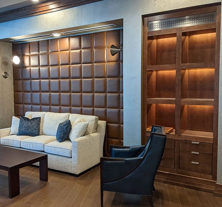 Interior lounge area with couches and shelving