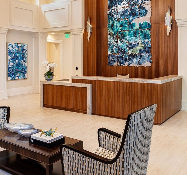 Bright lobby area with seating and artwork
