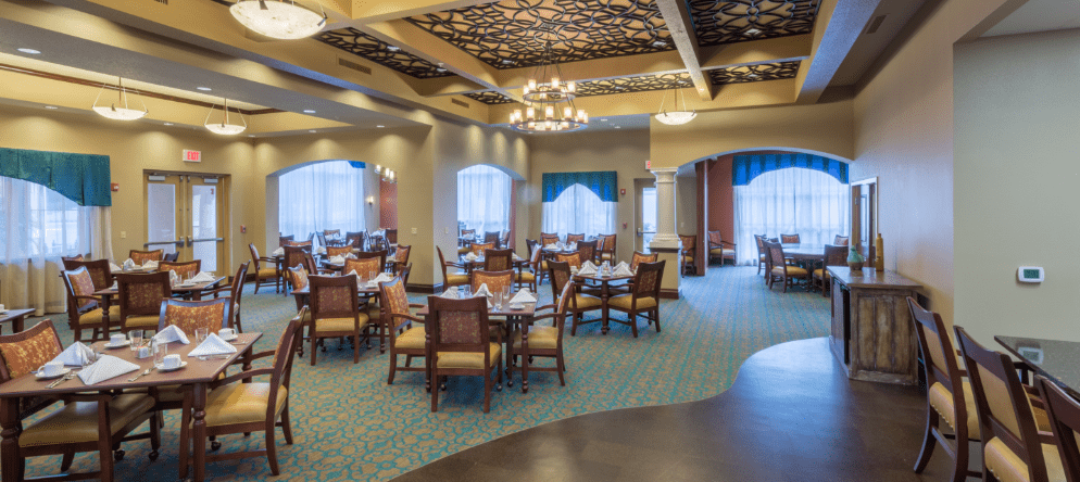 Dining area with tables and chairs in an elegant setting