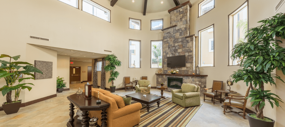 Bright and spacious lobby area with seating and plants