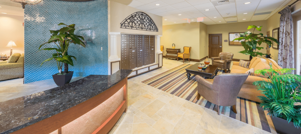 Bright lobby area with seating and decorative plants