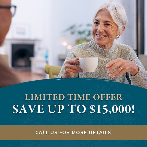 A resident enjoying a cup of coffee with a promotional offer displayed