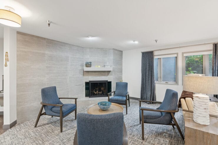 Cozy common area with seating and fireplace