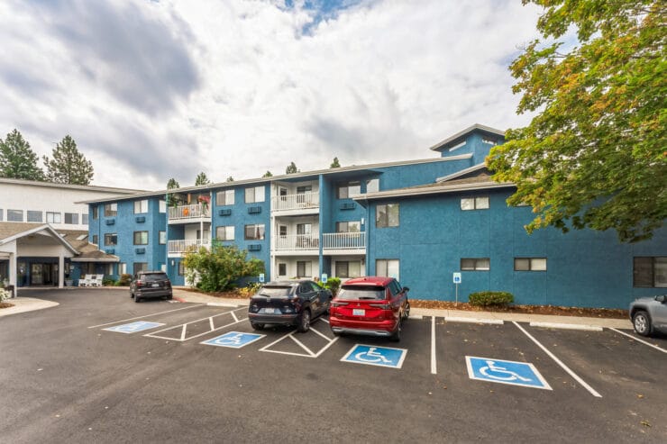 Exterior view of the facility with parking access.