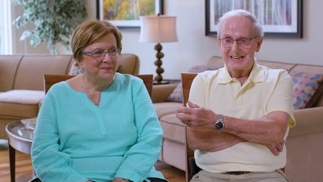 Two residents sharing a moment in a common area