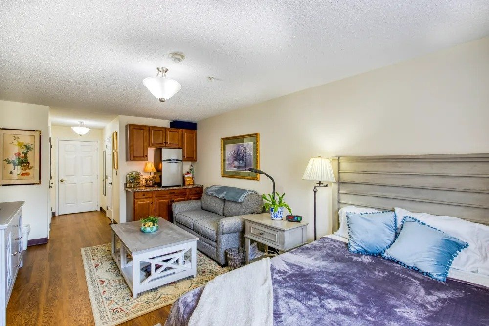 Bright and cozy resident room with kitchen area