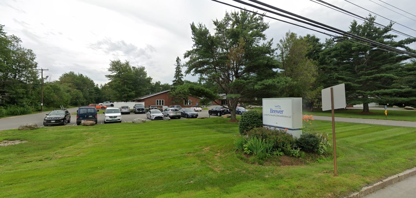 Exterior view of the facility with parking area