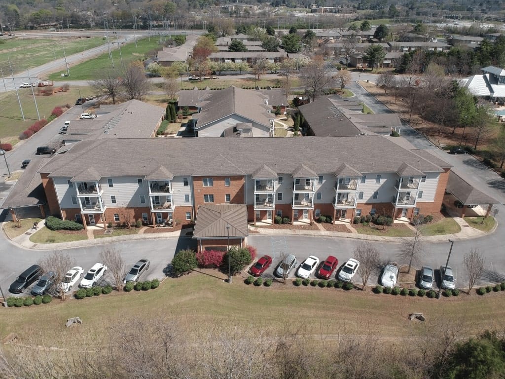 Country Cottage Huntsville, assisted living in Huntsville, AL — Aerial view of a senior living facility with parking