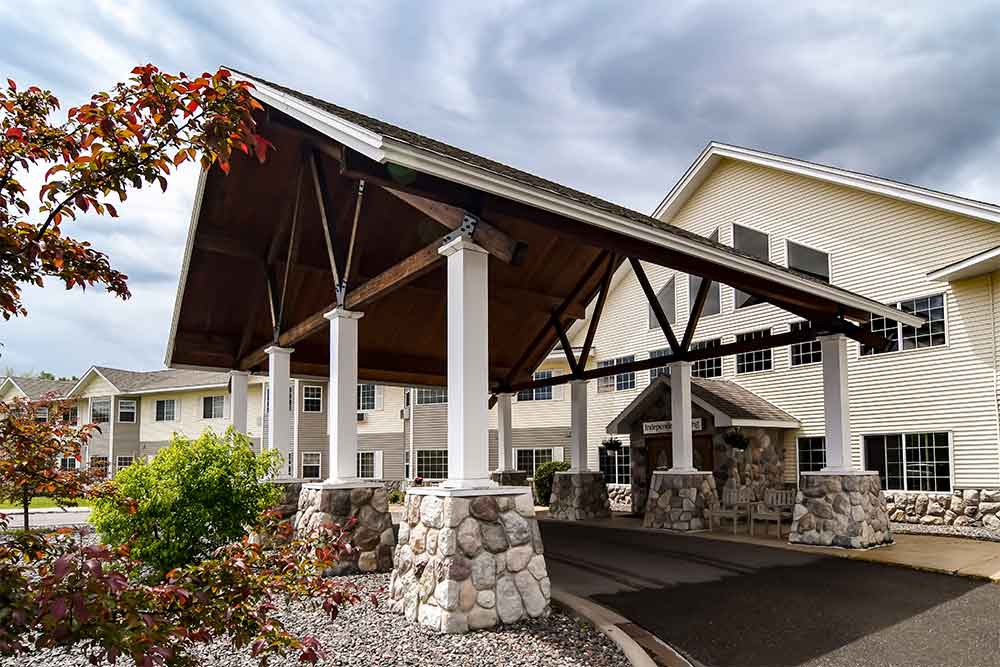 Front entrance of Edgewood Vista with stone pillars
