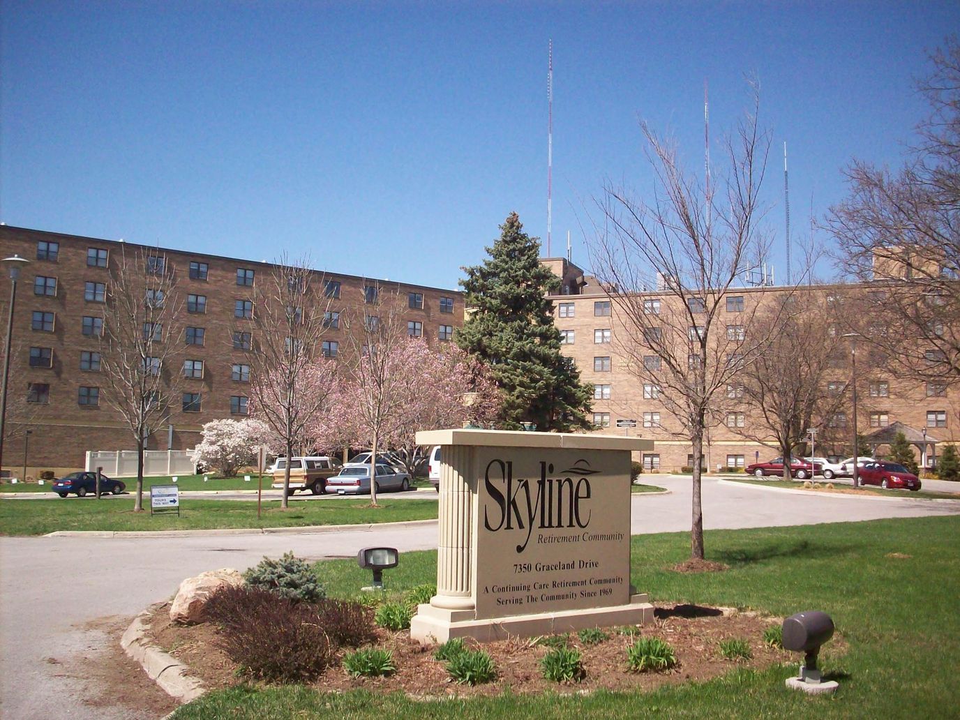Exterior view of Skyline Retirement Community with sign