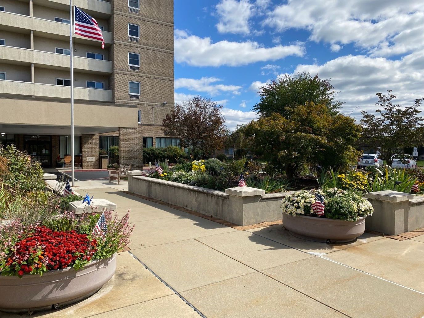 Exterior view of the facility with a landscaped garden