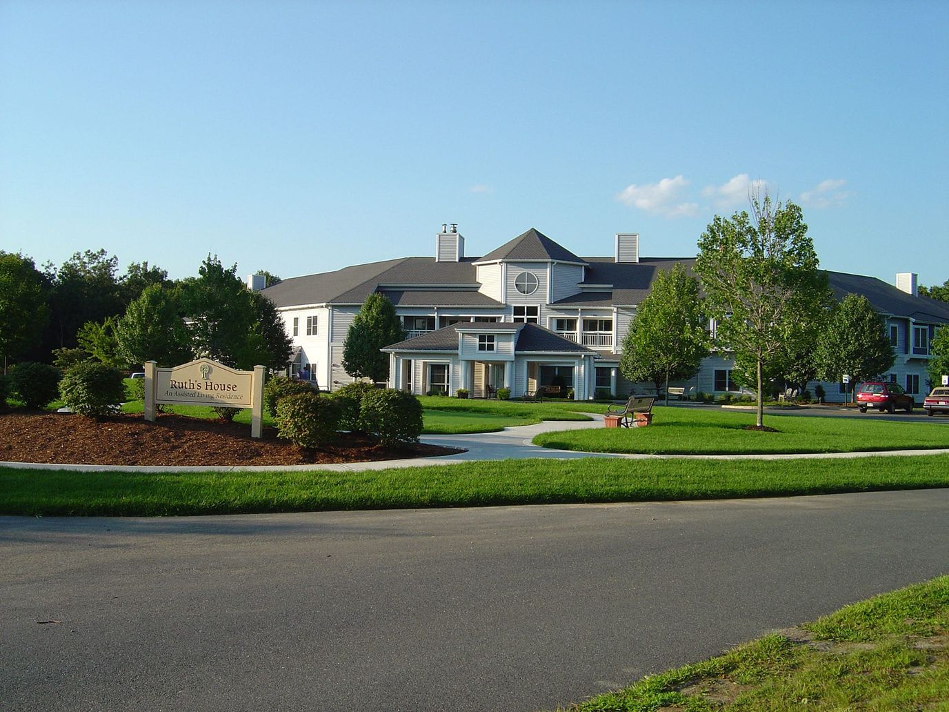 Exterior view of Ruth's House with landscaped surroundings