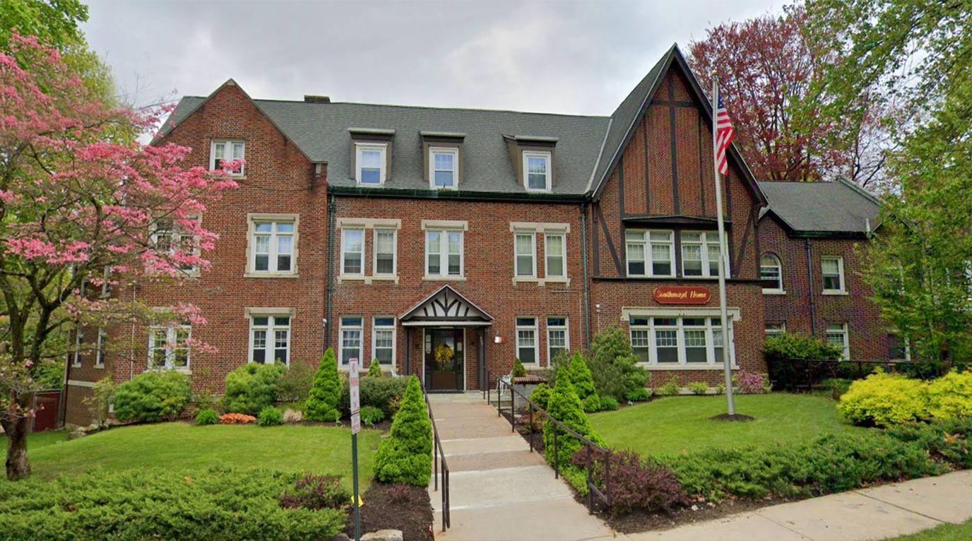 Exterior view of Southmayd Home for Women with landscaping